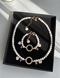 Bol charmlı inci set